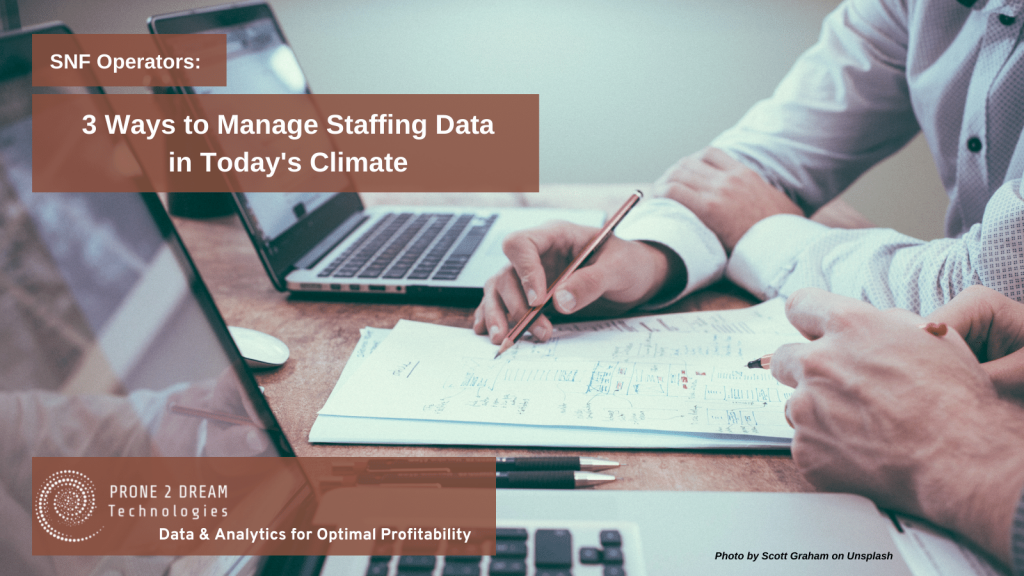 Executives working with data reports